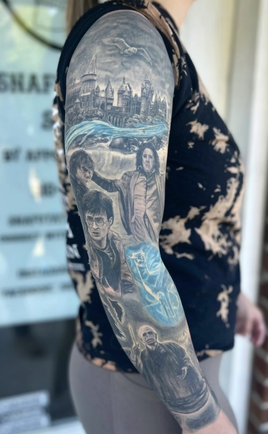 Fantasy sleeve tattoo by Jake Bebout at Snafu Tattoo Studio in Wilmington NC